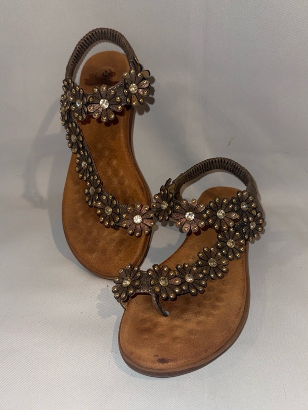Patrizia by Spring Step Metallic Bronze Floral Rhinestone Thong Sandals